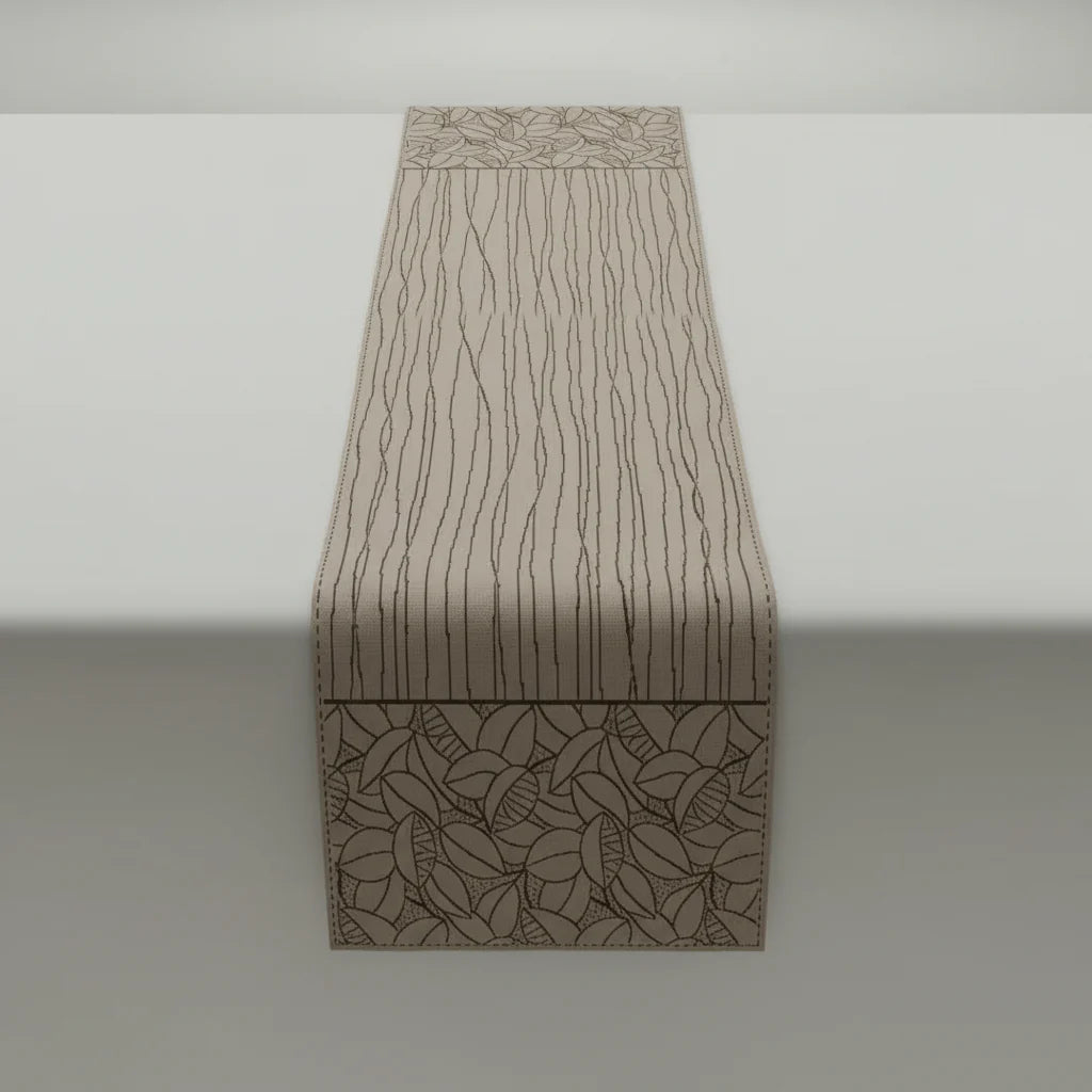 Beige woven table runner with abstract leaf and line patterns in neutral tones