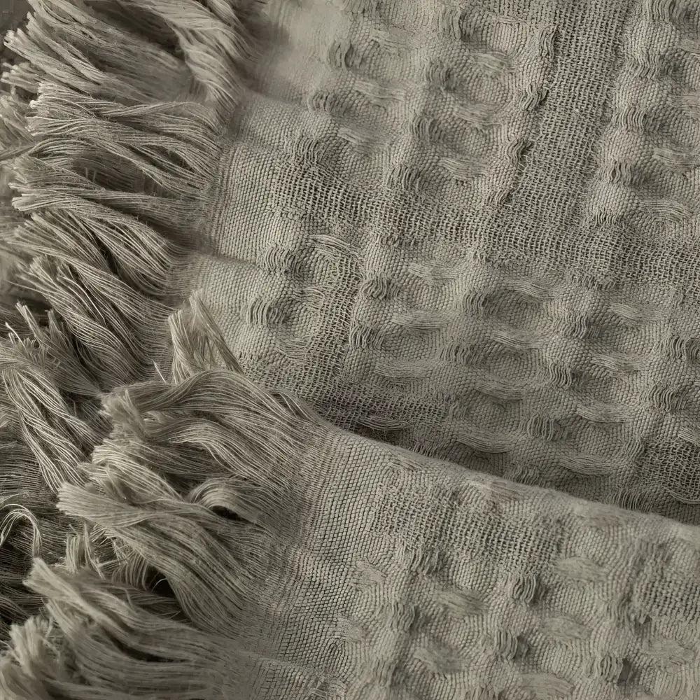Olive green fabric close up