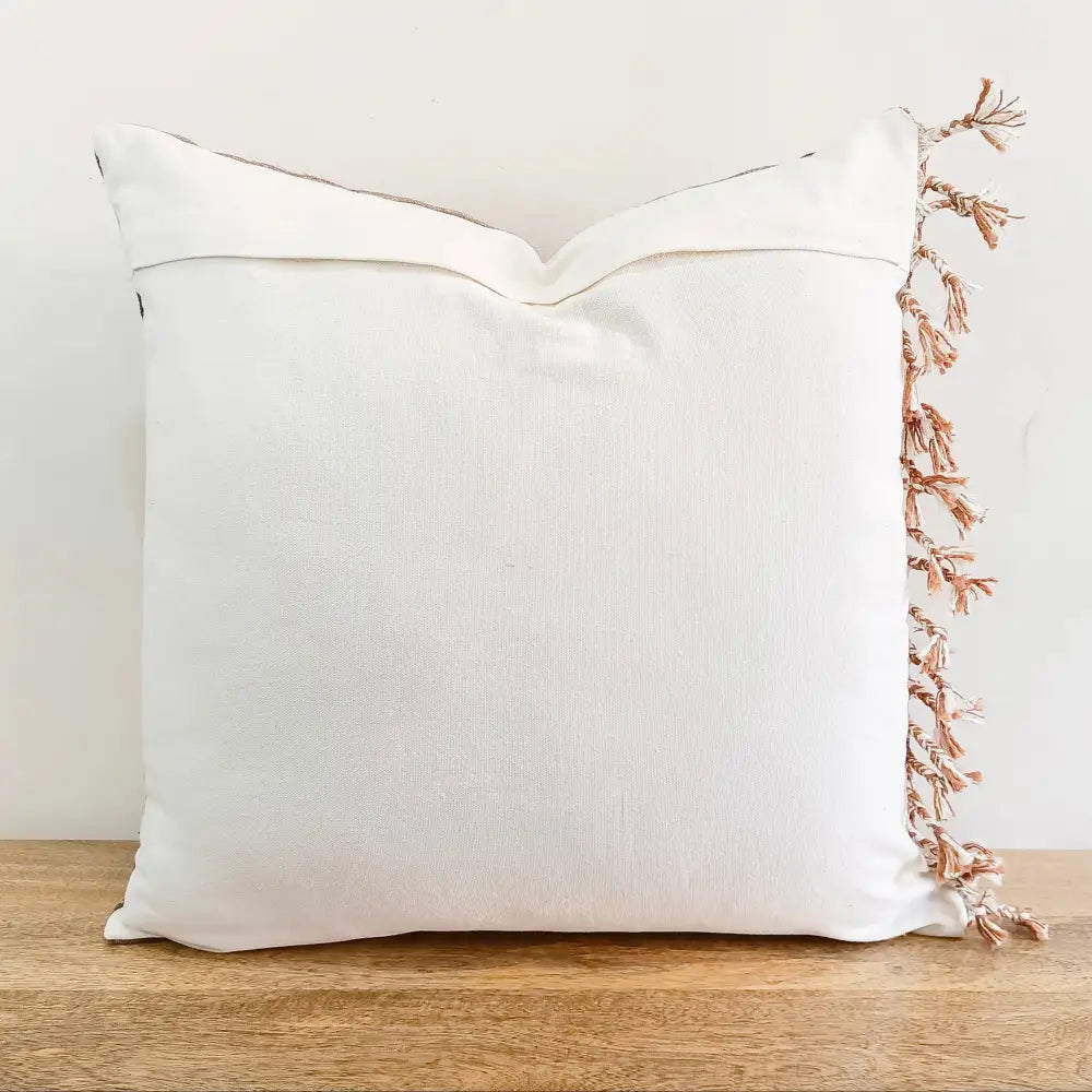 Throw pillow cover size 20 inch x 20 inch with rough linen texture, tassels, and hand embroidered accents.