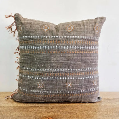 Throw pillow cover size 20 inch x 20 inch with rough linen texture, tassels, and hand embroidered accents.