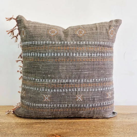 Throw pillow cover size 20 inch x 20 inch with rough linen texture, tassels, and hand embroidered accents.