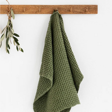 Forest green linen-cotton blend waffle towel with a hanging loop.