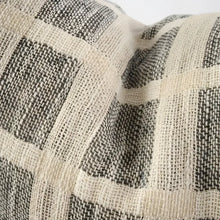 Linen pillow cover with grid design in off-white and slate colors.