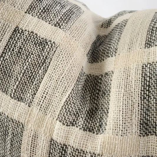 Linen pillow cover with grid design in off-white and slate colors.