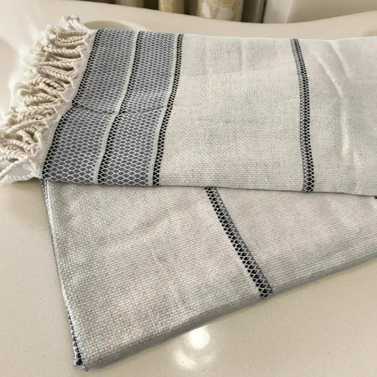 White and grey striped linen Turkish bath towel with tassels from Osprey
