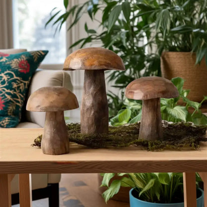 Set of three mango wood carved mushroom sculptures in natural tones