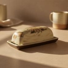 Cream Mara butter dish with gold sunflower lid