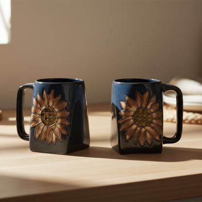 Handcrafted Mara Stoneware Sunflowers Square Mug with dark blue ceramic and raised golden-brown sunflower design