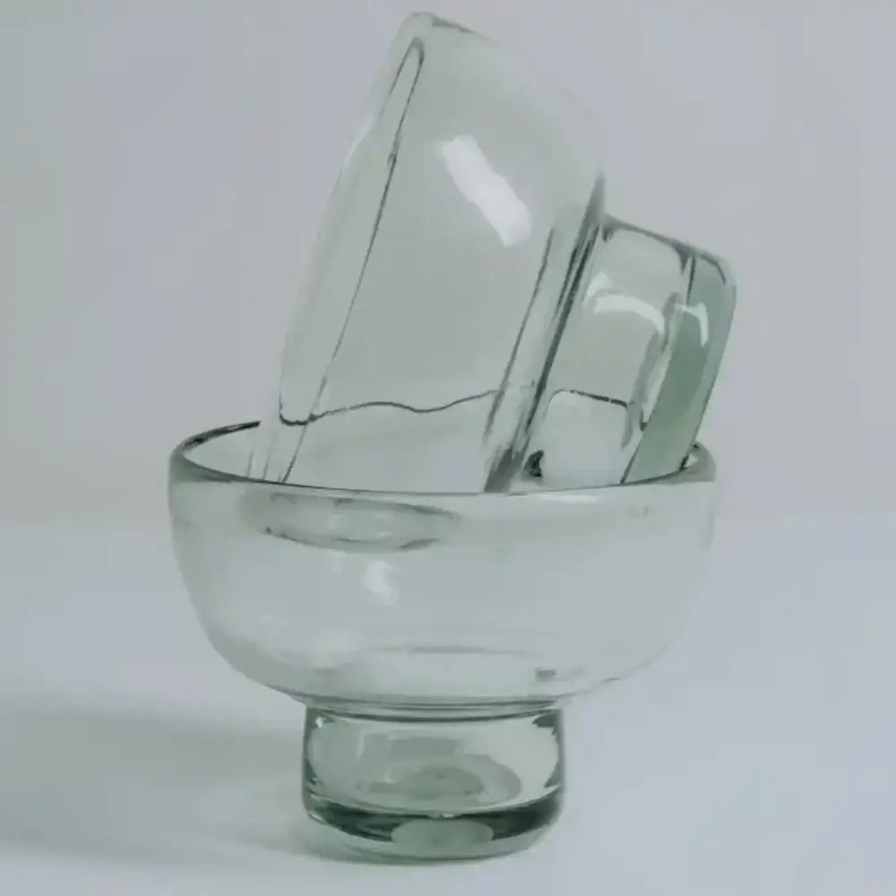 two Margarita / Mezcal Tasting Glasses on top of one another with a white background 