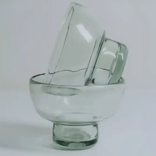two Margarita / Mezcal Tasting Glasses on top of one another with a white background 