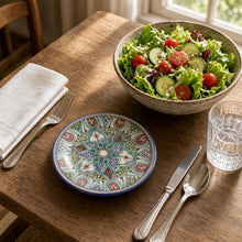 Colorful hand-painted amira ceramic dinner plate with mandala-like floral patterns in blue green pink and white