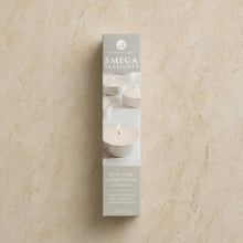 A sleek gray box of northern lights mega tealight candles with purest white wax and steady flame for long burn time