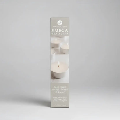 A sleek box of five northern lights mega tealight candles in purest white wax with a soft beige and white design