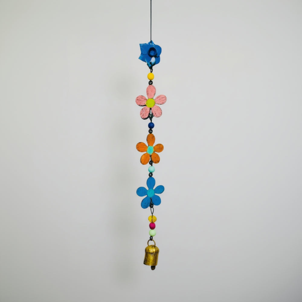 Colorful metal flower wind chime with painted blooms and gold bell