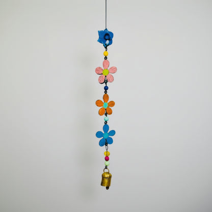 Colorful metal flower wind chime with painted blooms and gold bell