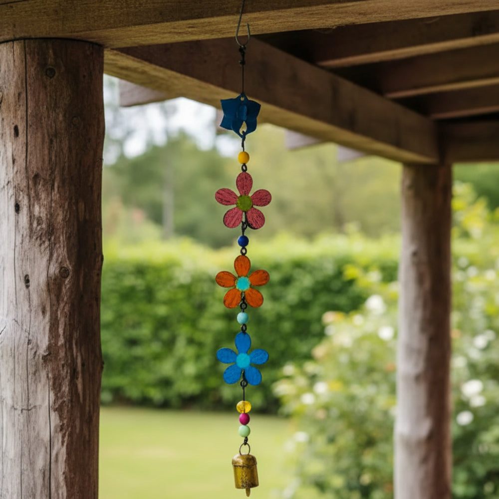 Colorful metal flower wind chime with crocheted blooms and golden bell