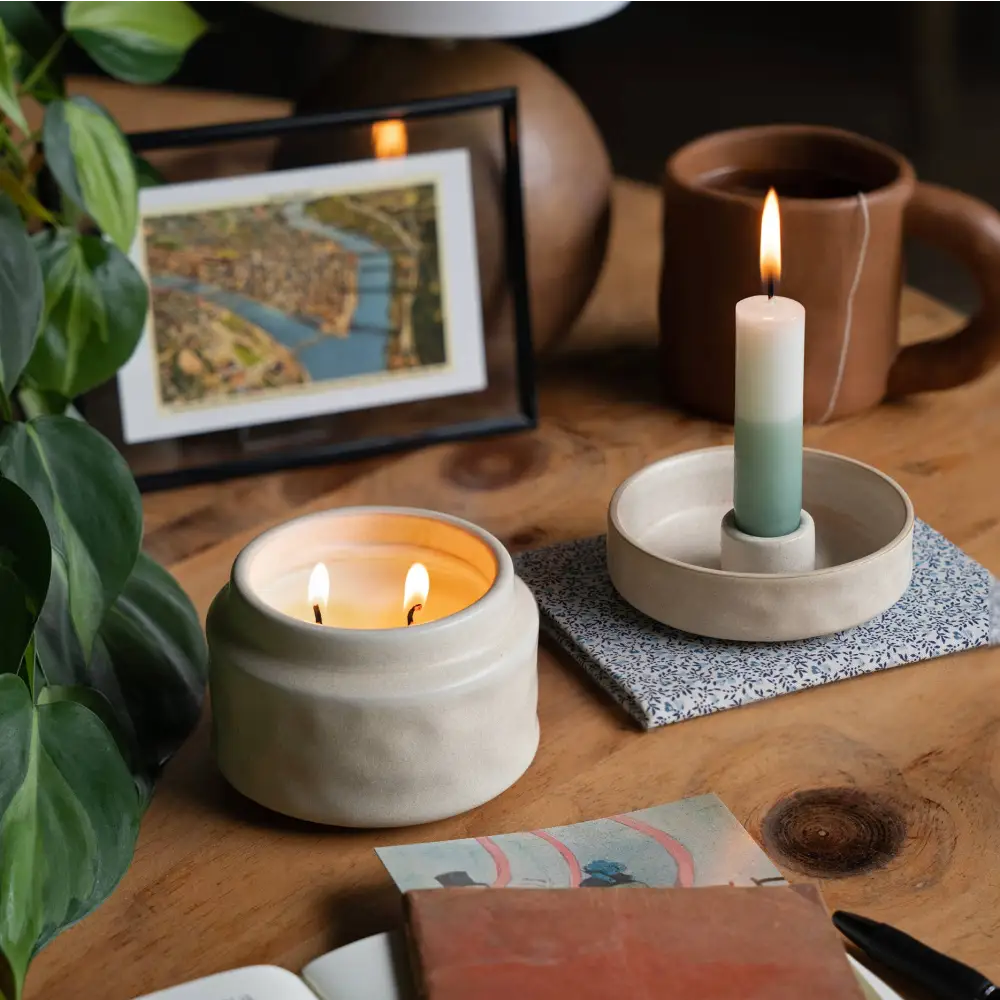 Mindful moments candle set featuring a slender two toned hand dipped taper in grove green and off white colors
