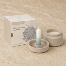 Beige ceramic mindful moments candle set with lotus blossom and agave scent featuring a hand-dipped taper and jar candle
