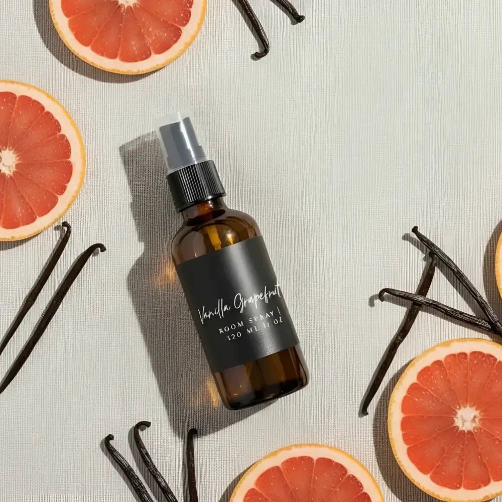 Mini handmade vanilla grapefruit room spray in amber glass bottle