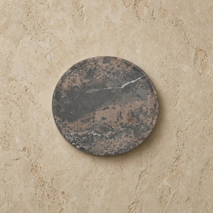 Circular soapstone plate with dark gray and brown veins in mini smudge nest curated set discover rookery nests