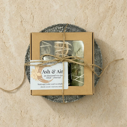 A beige cardboard mini smudge nest tied with twine containing sage trio and a soapstone plate discover rookery nests