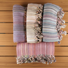 Colorful Turkish beach towel with stripes and tassels, perfect sand free beach throw