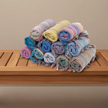 Colorful Turkish beach towel with stripes and tassels, perfect sand free beach towel