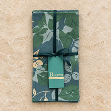 Set of 4 green and blue floral napkins made of absorbent cotton hand silk-screened in a fair-trade bali workshop tied with ribbon