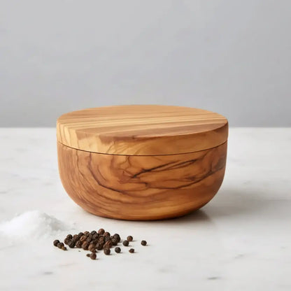 Olive wood dual compartment spice and herb cellar with round shape, natural grain, warm finish, and swiveling magnetic lid