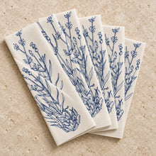Set of five cream organic cotton napkins with original navy blue lavender cotton print for elegant dining