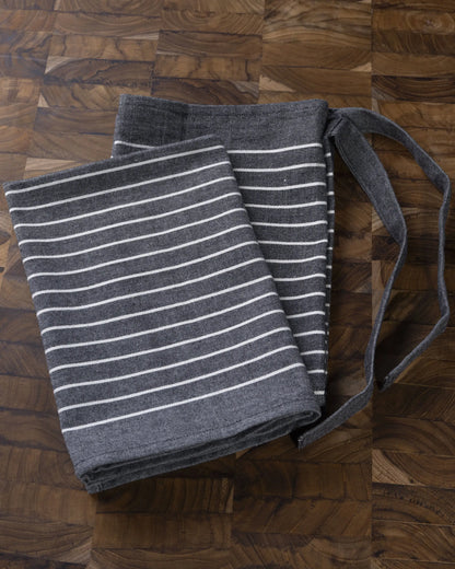 Charcoal gray striped woven tote bag with adjustable strap