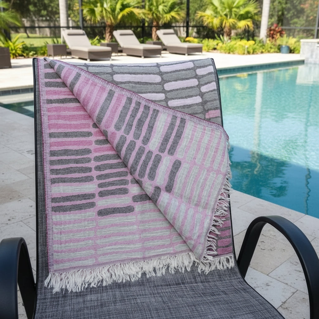 Pink and gray abstract reversible Turkish towel with fringe, quick drying sand resistant design