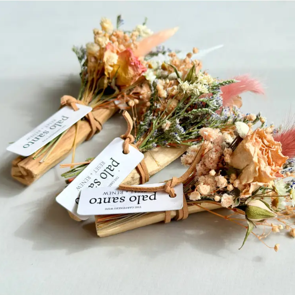 Handmade eco-friendly palo santo with dried peach flowers