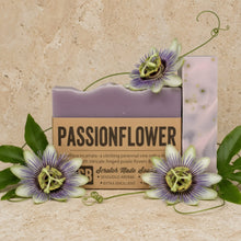Purple passionflower soothing aromatic bar soap with marbled surface and green vines, infused with soothing organic oats and ylang ylang
