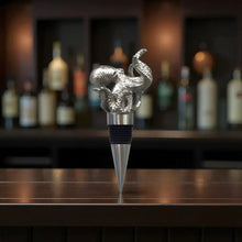 Silver elephant pewter wine stopper with octopus design and textured base