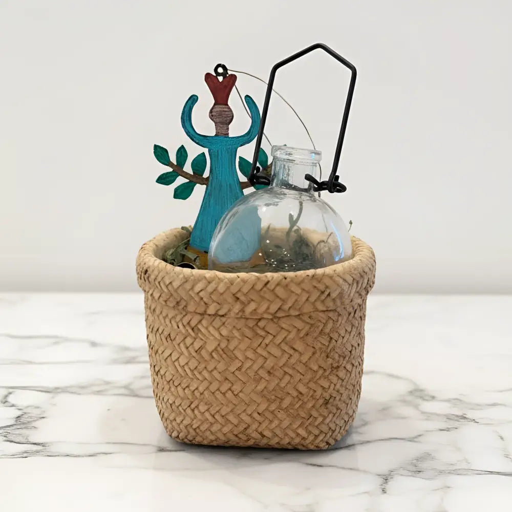 Curated set propagation vase with beige basket, turquoise angel figurine