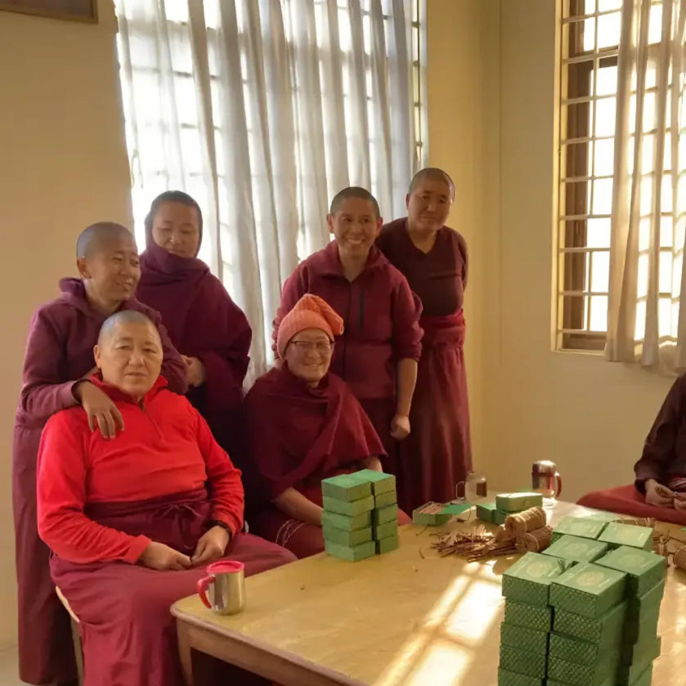 Stacks of green rectangular pure natural incense blocks made by tibetan nuns from khachoe ghakyil ling nunnery
