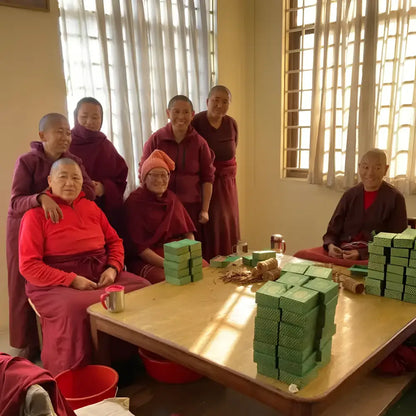 Stacks of green rectangular pure natural incense blocks made by tibetan nuns from khachoe ghakyil ling nunnery