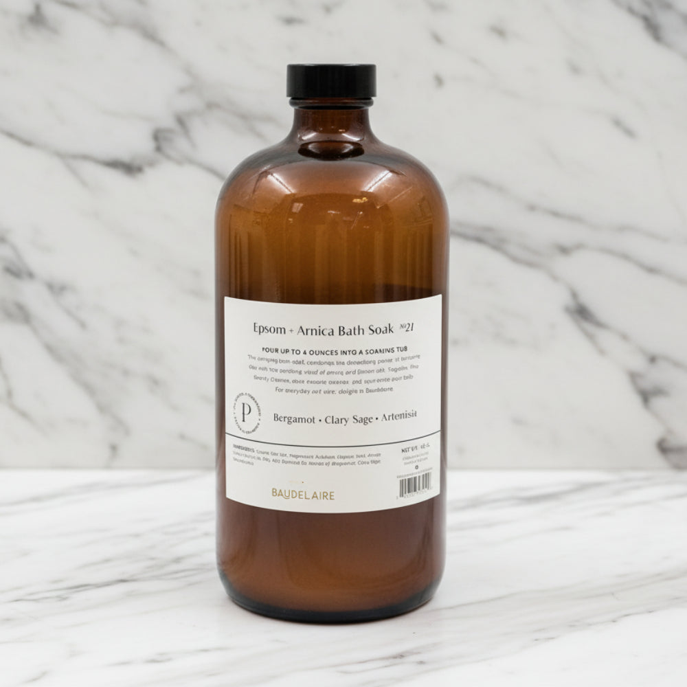 PURIFY Epsom + Arnica Soak 40oz in Baudelaire amber bottle