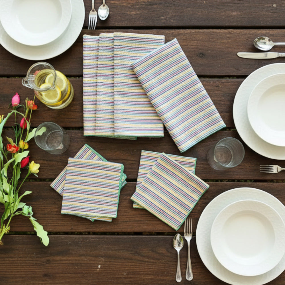 Set of 4 rainbow seersucker cloth napkins in pastel stripes with green border