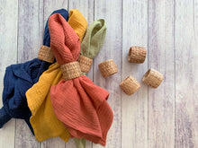 Set of 4 handmade eco-friendly rattan napkin rings with colorful napkins