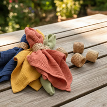 Set of 4 handmade eco-friendly rattan napkin rings with colorful napkins