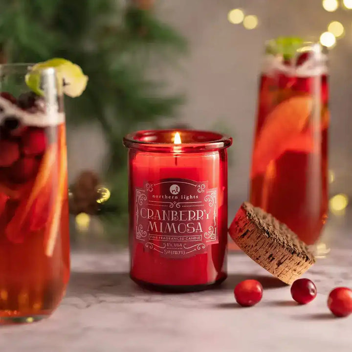 Red cranberry mimosa scented candle from Seasonal Spirit Candles for a festive mood