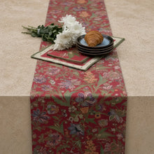 Red floral table runner handmade with intricate purple green and gold patterns for stylish table decor