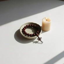 Dark red red rosewood bracelet with plain 8mm beads and knotted cord perfect for essential oils use