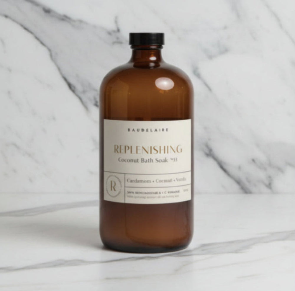 Sleek amber Baudelaire Replenish Coconut Bath Soak bottle, handmade 40oz