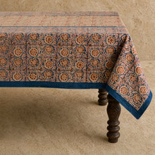 Reversible compass paisley print tablecloth with terracotta and navy geometric floral pattern on beige background