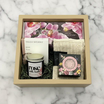 Rose Retreat Nest set with rose milk bath, candles, soap, steamers and soak