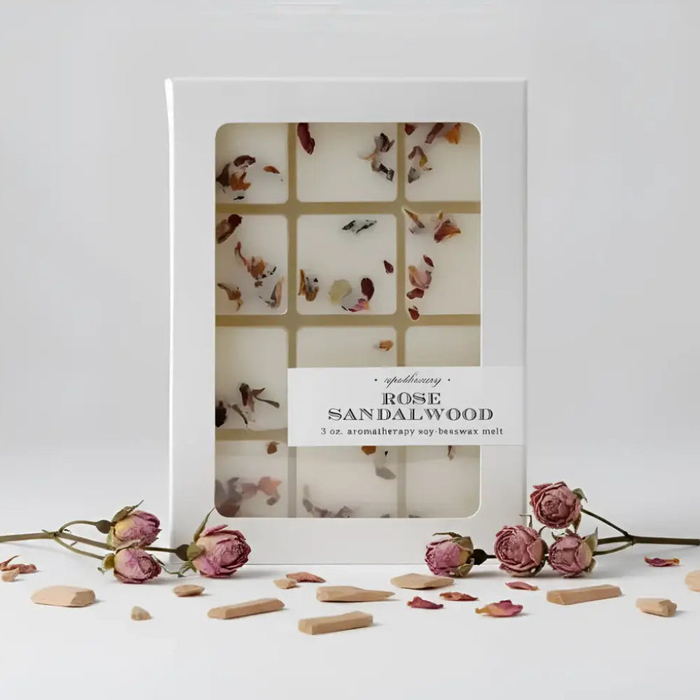 White rectangular box with rose sandalwood wax melts made from soy-beeswax blend and dried flower petals