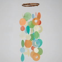 Colorful translucent round capiz chime with bamboo top and orange blue green hanging pieces